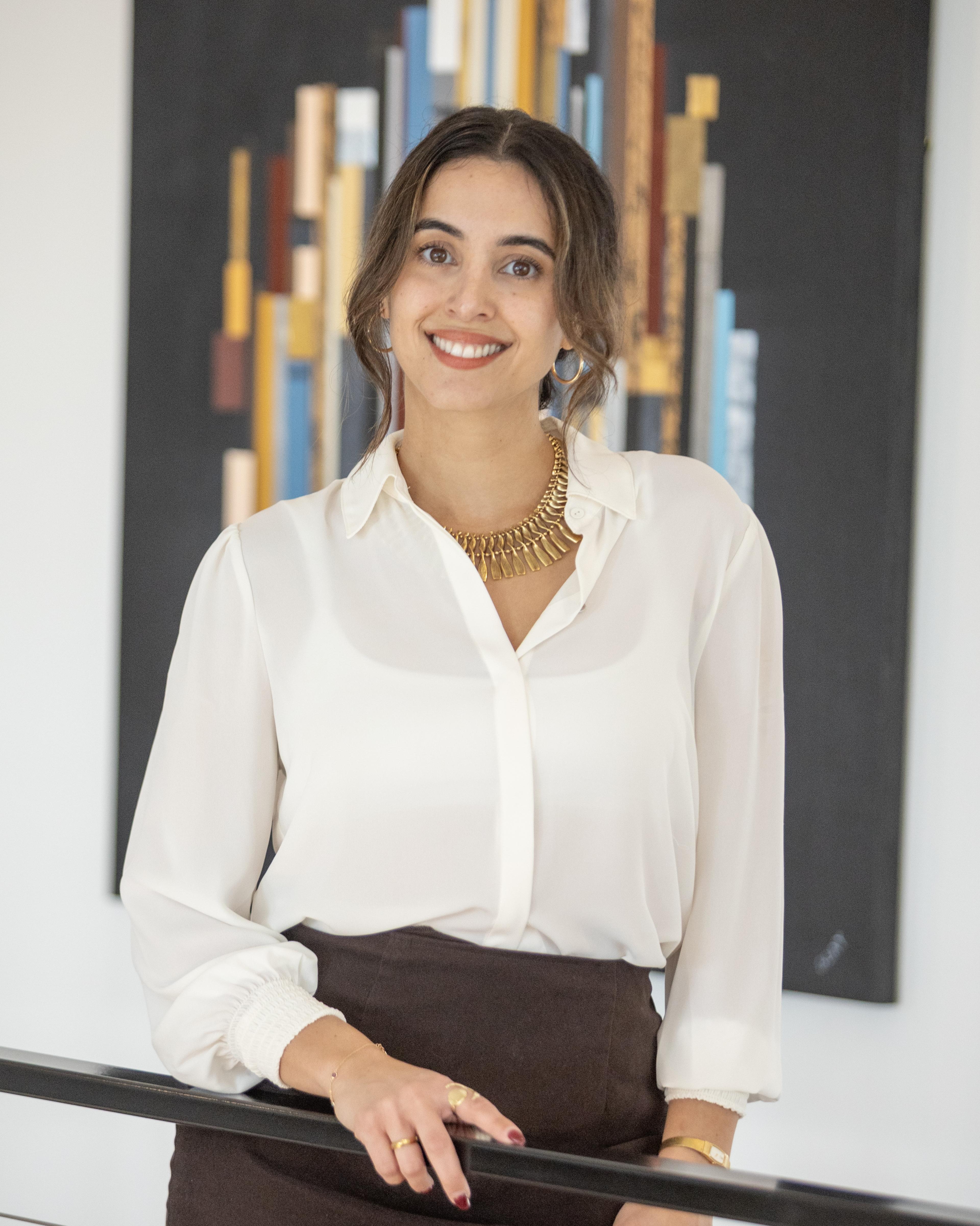Jennifer Ferrara, Nook Lending loan officer, smiling in a business blazer